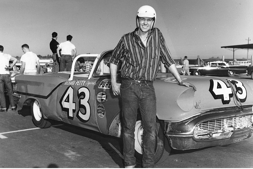 Richard Petty and his 1957 Oldsmobile convertible at the first annual Daytona 500, February 22, 1959 in Daytona Beach, Florida