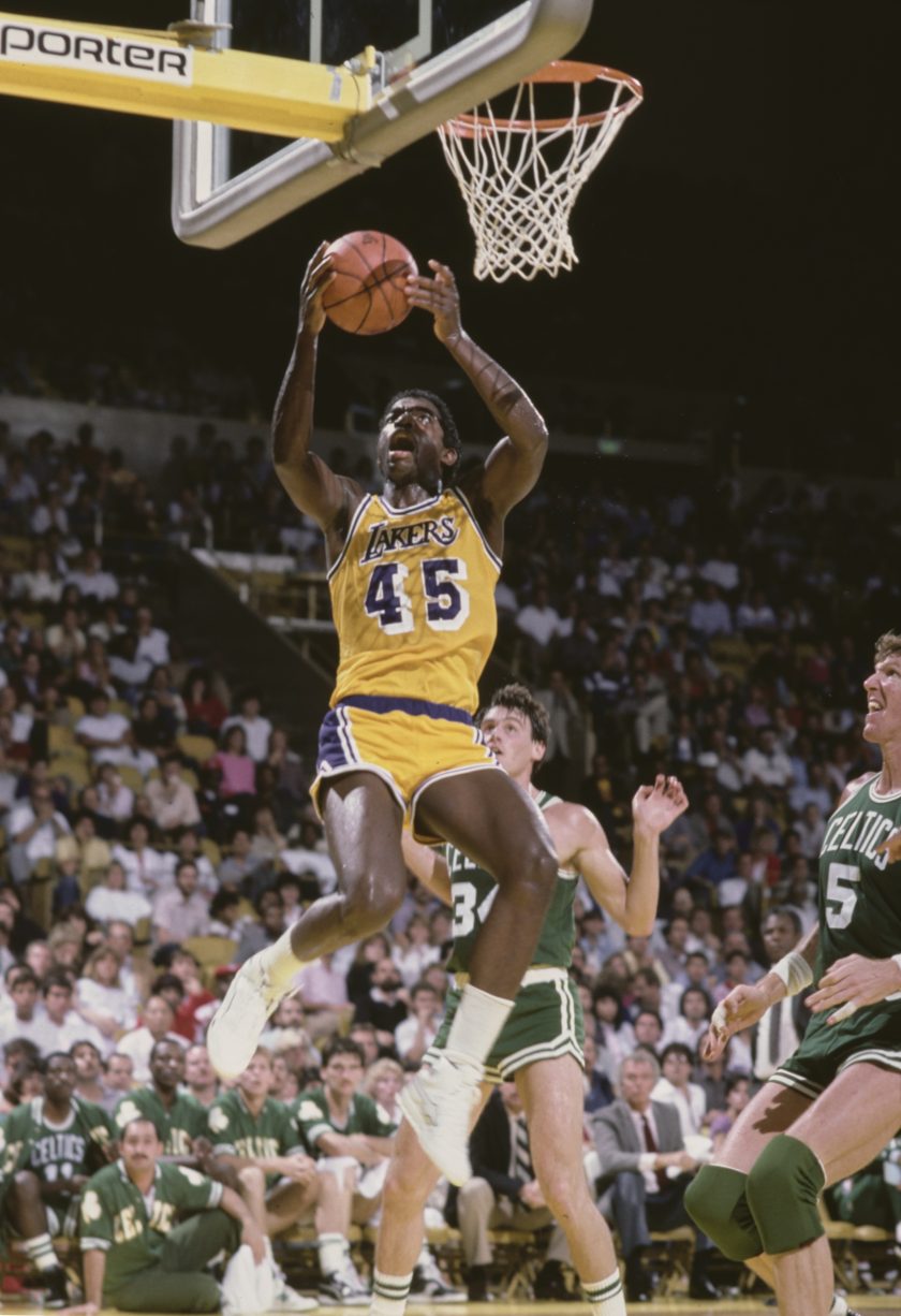 AC Green drives to the basket during a 1985 game.