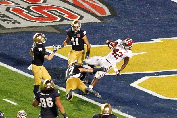 Alabama running back Eddie Lacy spins into the end zone against Notre Dame in the 2013 BCS National Championship Game.