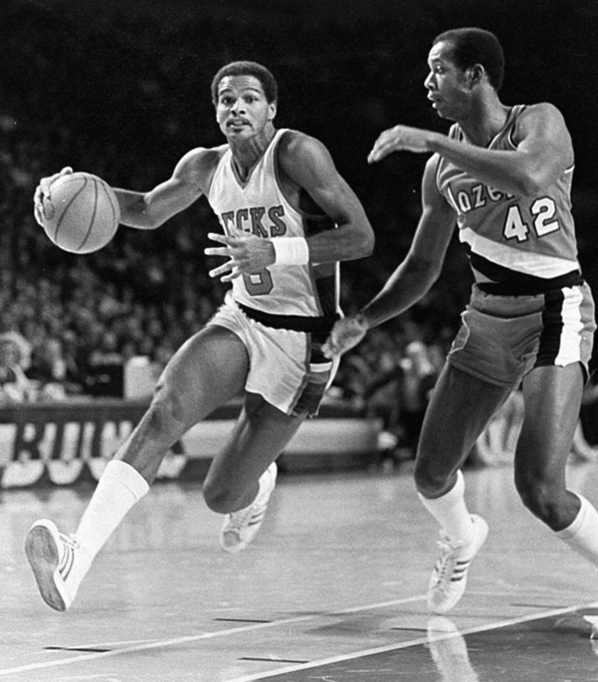 Marques Johnson dribbles the ball during a 1970s Bucks game.