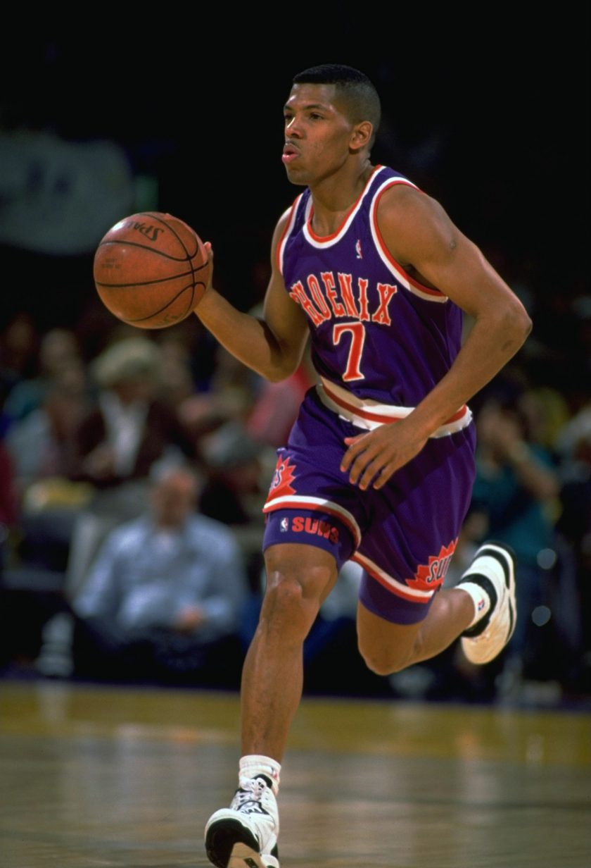 Kevin Johnson dribbles in 1991.
