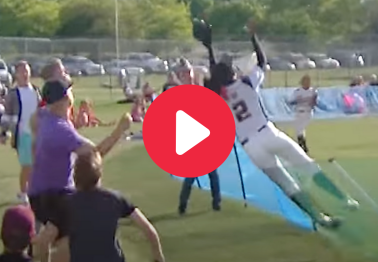Softball Star Jumps Over Fence for Viral Home Run-Saving Catch