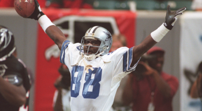 Michael Irvin celebrates after scoring a touchdown against the Atlanta Falcons.