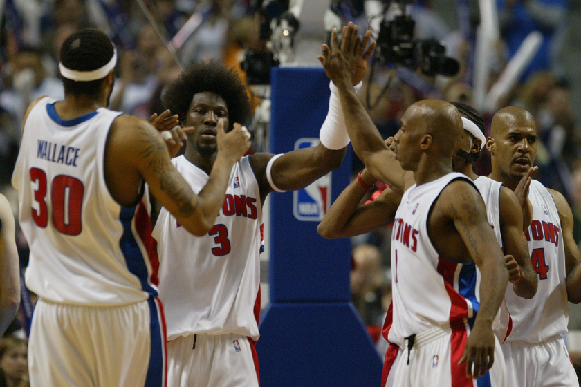 The Detroit Pistons celebrate after a big play.