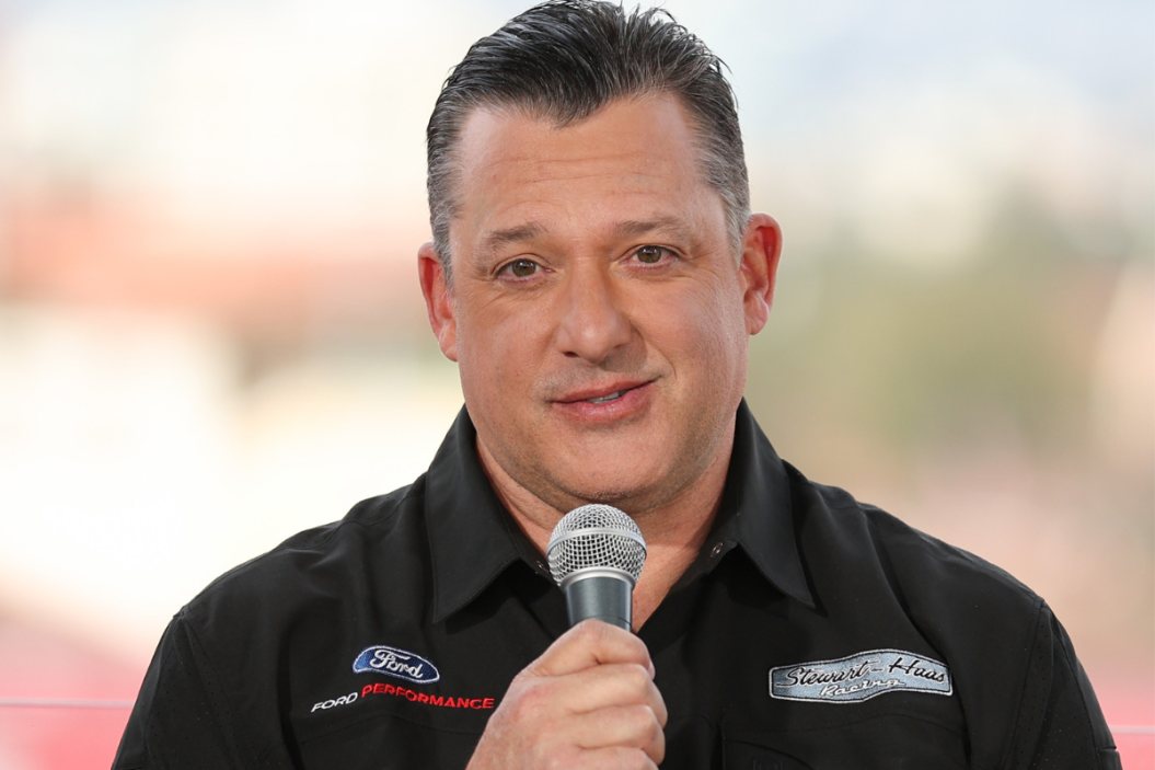 Tony Stewart talks on microphone during the Fox Sports NASCAR Press Conference at the Los Angeles Coliseum in 2023