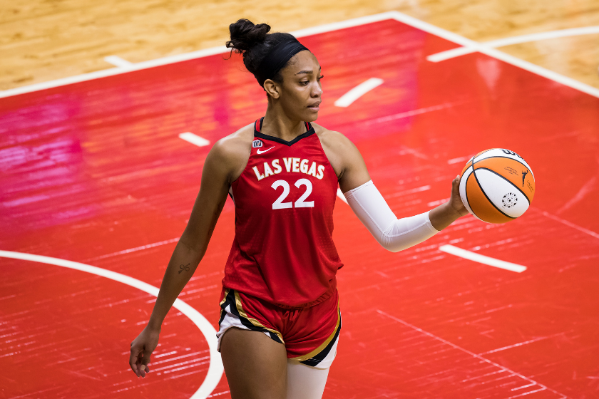 A'ja Wilson dribbles the ball in warmups before a Las Vegas Aces game