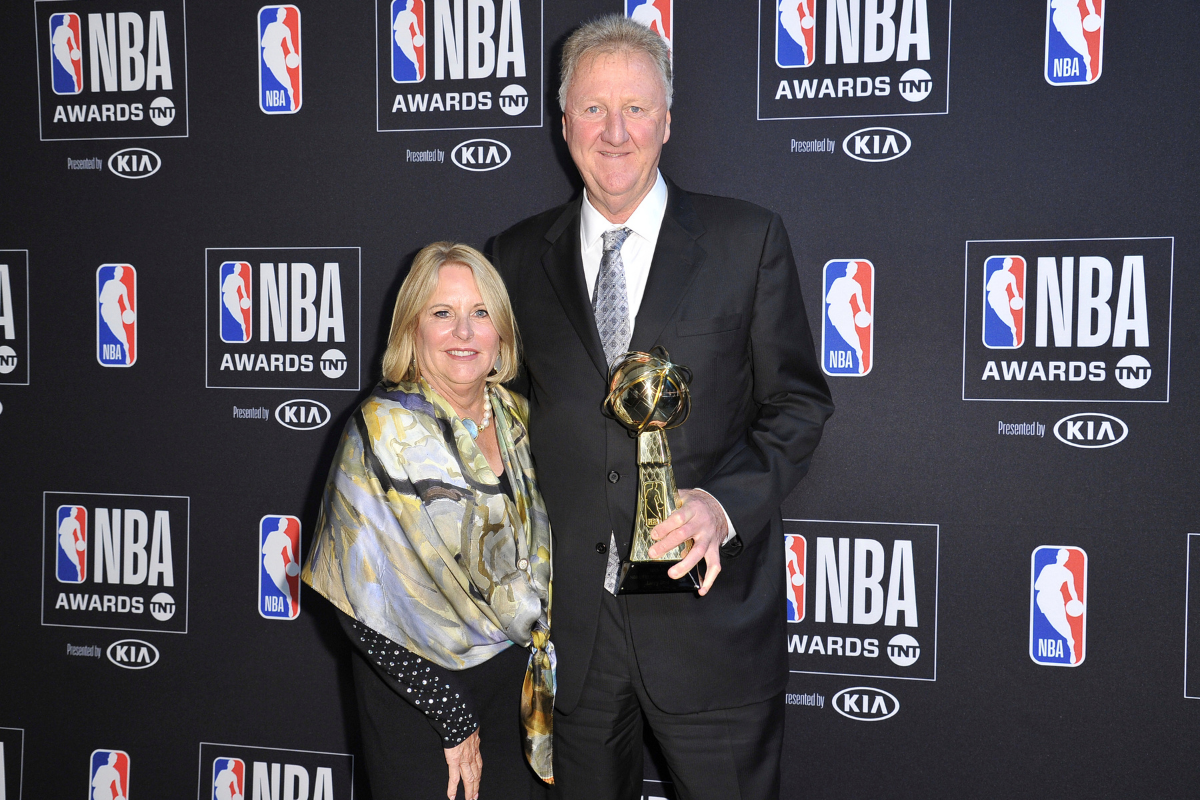 Larry Bird poses with his wife Dinah.