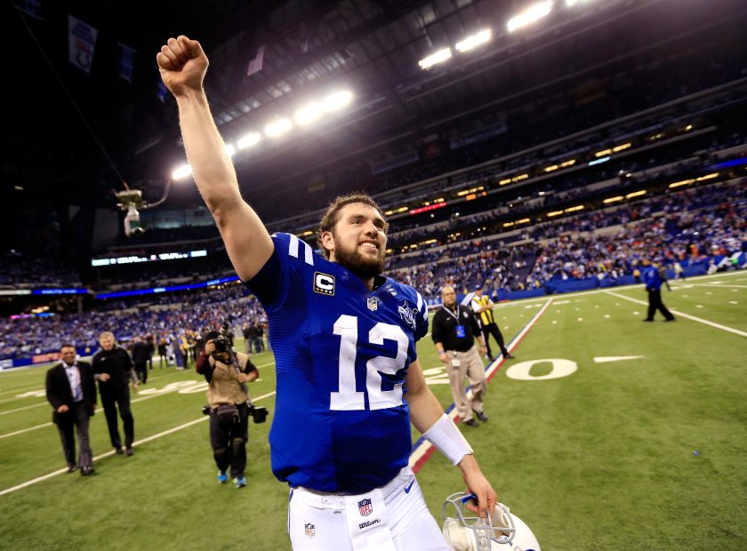 Andrew Luck celebrates after defeating the Kansas City Chiefs 45-44 in a Wild Card Playoff game in 2014.