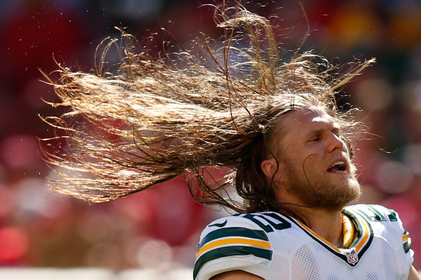 Clay Matthews whips his hair during a 2015 game.