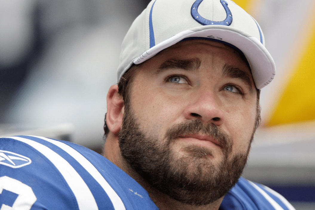 Jeff Saturday #63 of the Indianapolis Colts watches the replay board while the Colts play against the Houston Texans