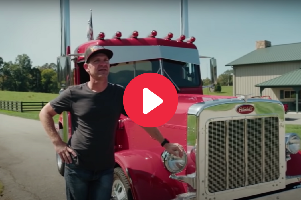 clint bowyer stands next custom '79 peterbilt truck