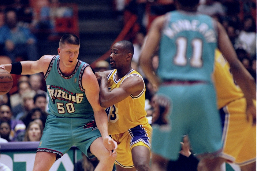 Bryant Reeves backs down a Los Angeles Lakers defender in the post.