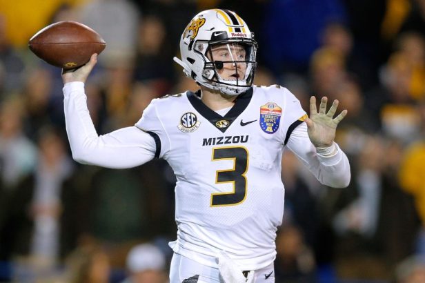 Drew Lock passes during the 2018 Liberty Bowl.