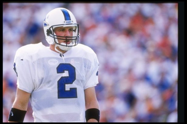 Tim Couch walks on the field playing Florida in 1996.