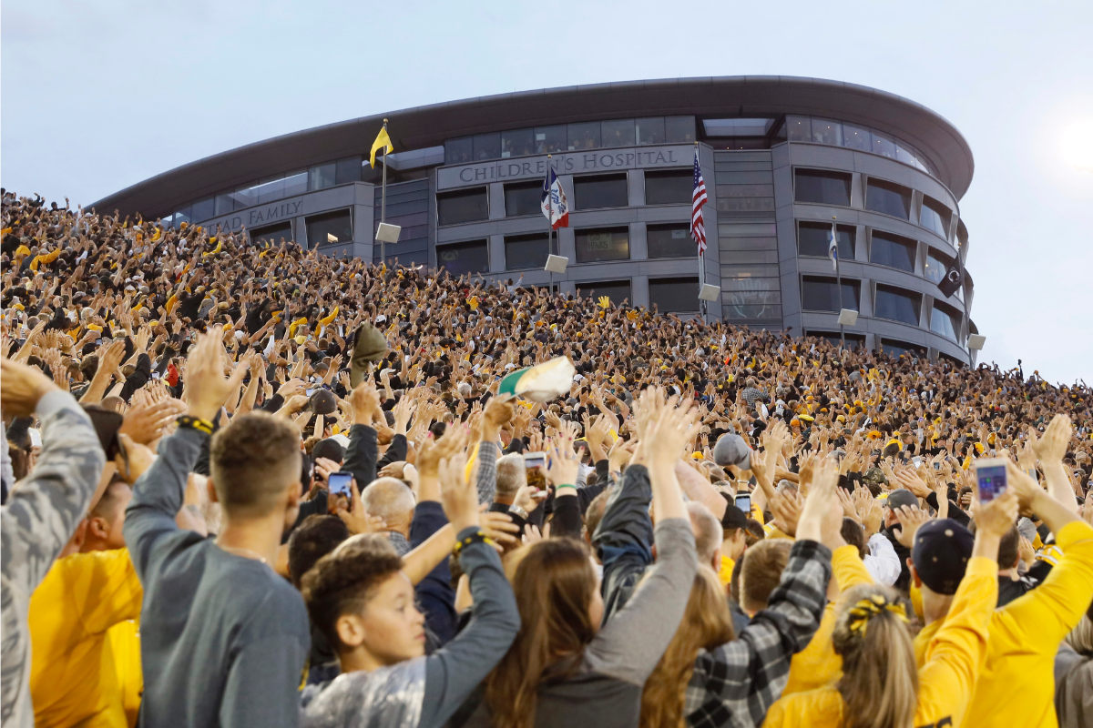 Iowa Wave The Inspiring College Football Tradition + How It Started