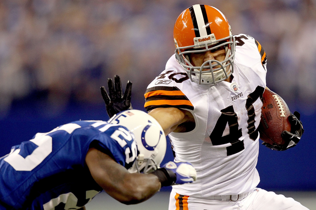 Peyton Hillis #40 of the Cleveland Browns carries the ball against Jerraud Powers #25 of the Indianapolis Colts at Lucas Oil Stadium