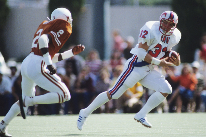 Craig James #32 of the SMU Mustangs carries the ball during a game against the University of Texas Longhorns 
