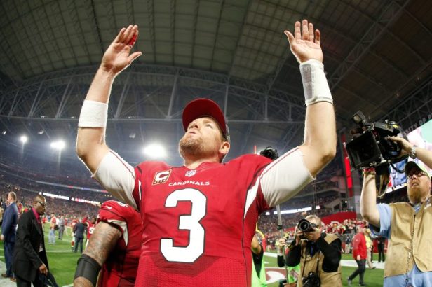 Carson Palmer celebrates after beating the Packers in the 2016 NFC Division Playoff game.