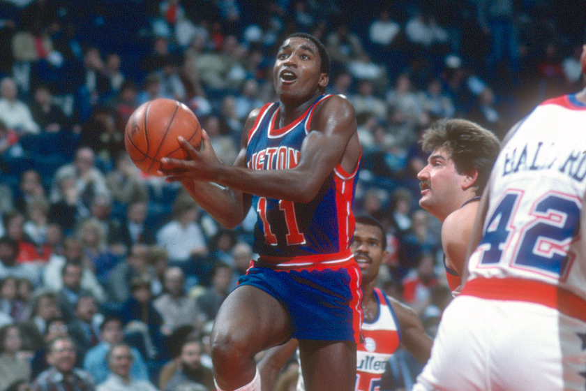Detroit Pistons guard Isiah Thomas goes up for a lay up against the Washington Bullets.