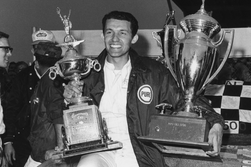 richard petty holds trophies in victory lane after winning 1966 daytona 500