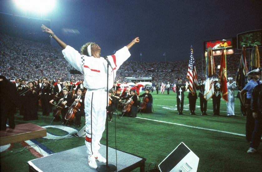 Whitney Houston sings the National Anthem before Super Bowl XXV.