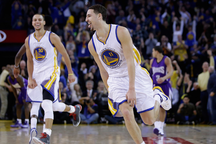 Klay Thompson reacts after hitting a three-pointer during his record breaking 37-point third quarter.