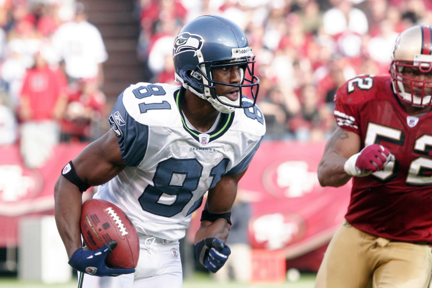 Nate Burleson returns a kick for the Seattle Seahawks.