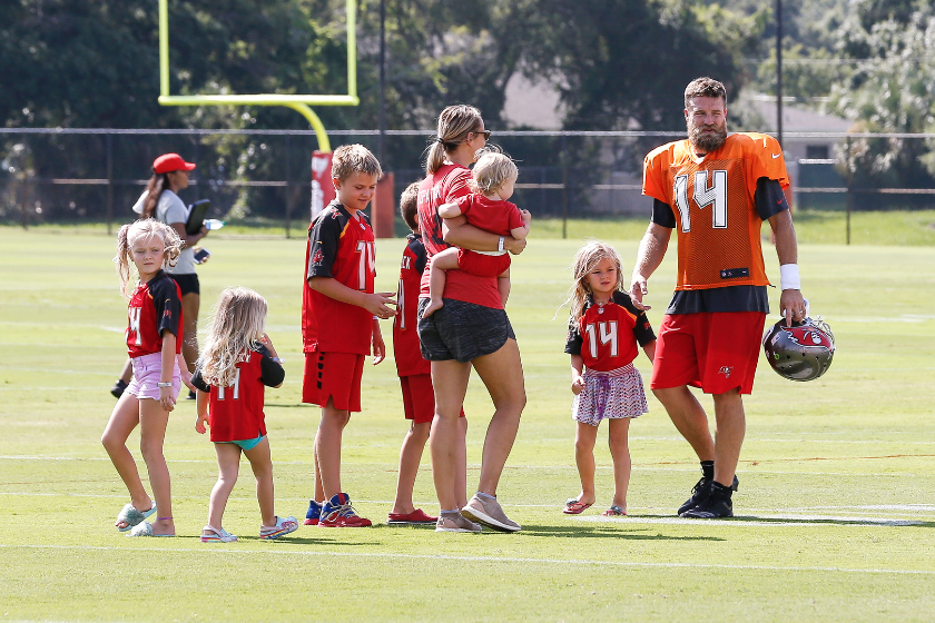 Ryan Fitzpatrick and his kids at a Tampa Bay Buccaneers practice.