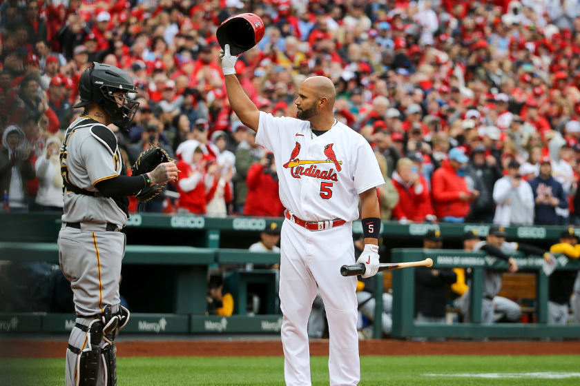 Albert Pujols of the St. Louis Cardinals acknowledges a standing ovation by fans as he comes up to bat during the first inning against the Pittsburgh Pirates