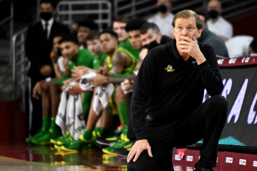 Oregon head coach Dana Altman brainstorms against USC.