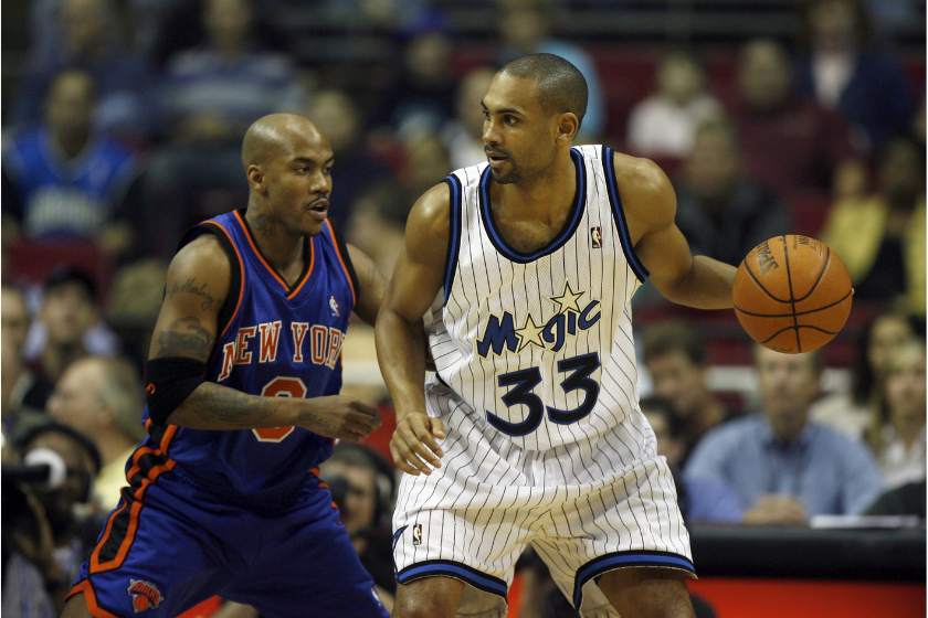 Grant Hill posts up against the New York Knicks.