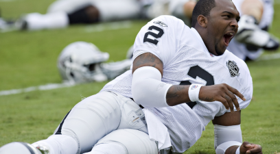 Jamarcus Russell yawns during Raiders camp.