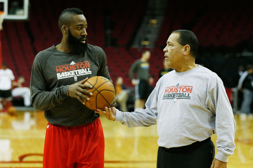 Rockets assistant coach Kelvin Sampson (R) chats with James Harden #13 prior to the start of the game between the New Orleans Hornets v Houston Rockets