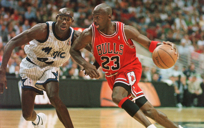 Michael Jordan drives against the Orlando Magic.
