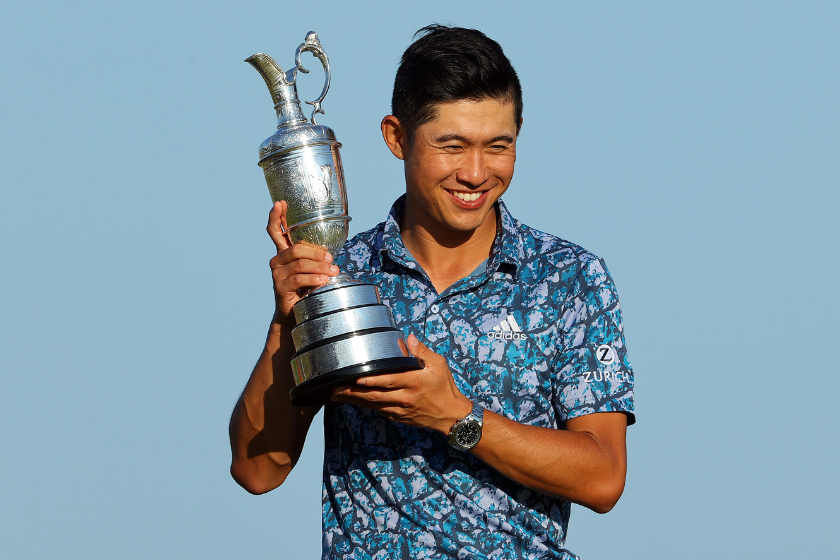 Collin Morikawa and the Claet Jug after winning The Open Championship in 2021