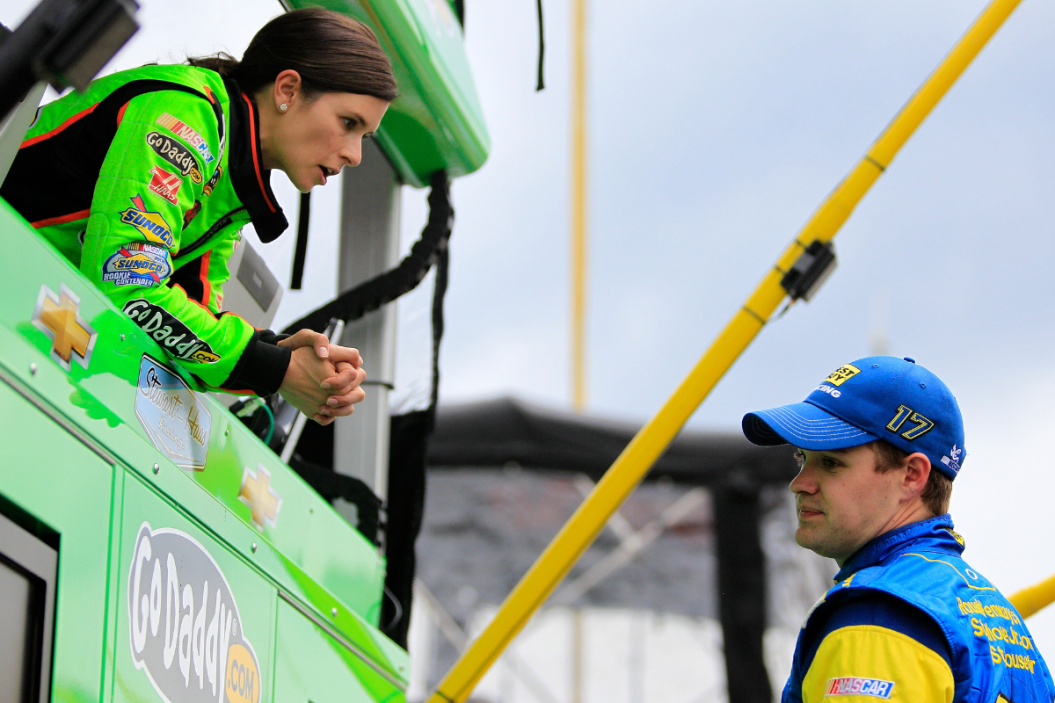 Danica Patrick talks with Ricky Stenhouse Jr. during caution period at 2013 Aaron's 499 race