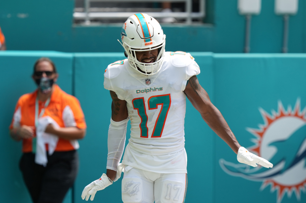Jaylen Waddle #17 of the Miami Dolphins celebrates after scoring a touchdown reception in the second quarter of the game at Hard Rock Stadium