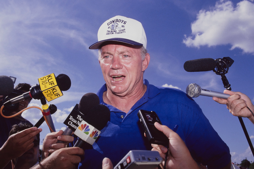 Jerry Jones, owner, president, and general manager of the Dallas Cowboys addresses the press microphones during training camp