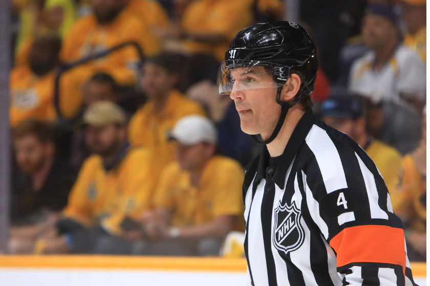 NHL referee Wes McCauley looks on during a 2022 NHL Playoff game.