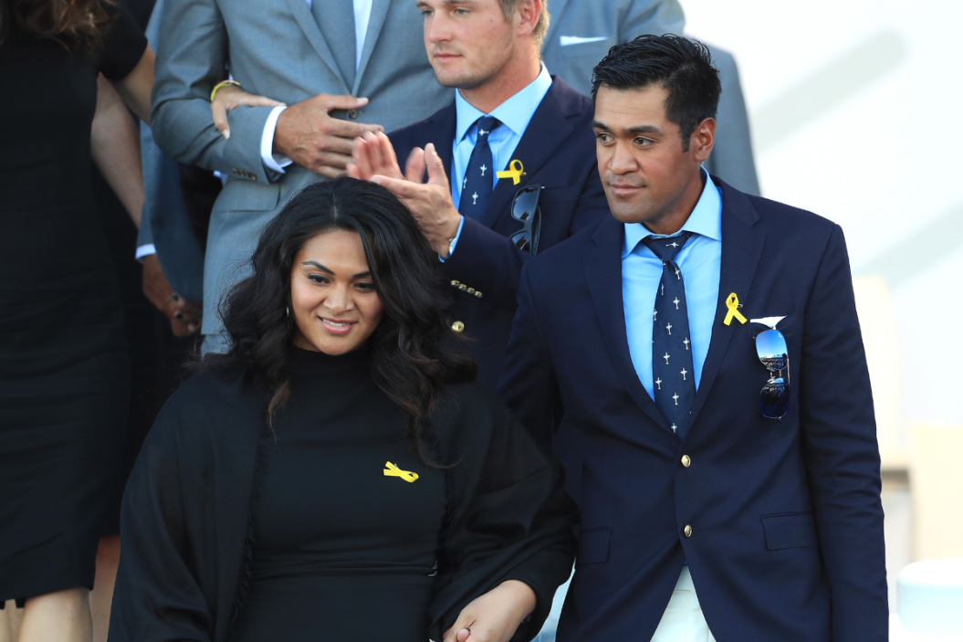 Tony Finau of the United States and wife Alayna Finau depart the opening ceremony for the 2018 Ryder Cup at Le Golf National