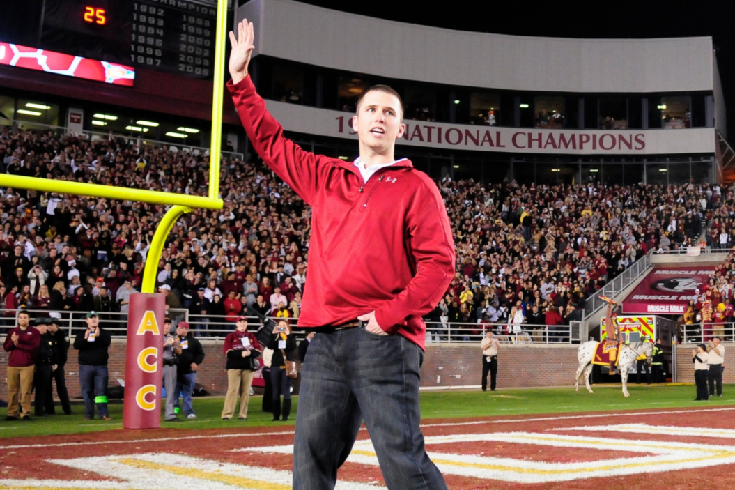 Buster Posey waves to the Florida State crowd at a Seminoles home game.