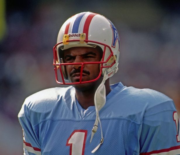 Warren Moon looks on during a game in 1989.
