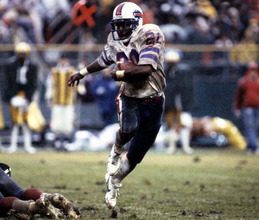 Joe Cribbs runs with the ball during a 1982 NFL game.