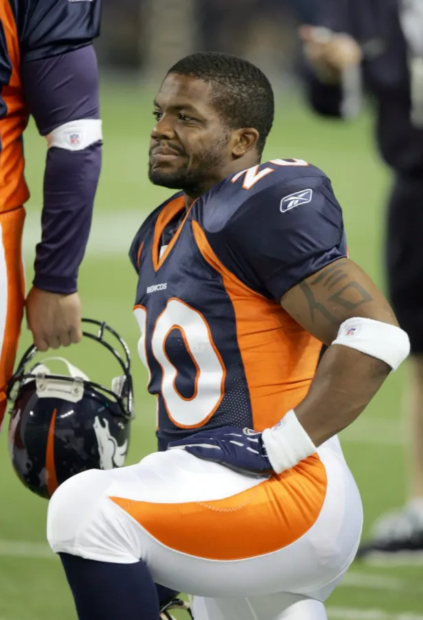 Maurice Clarett watches action from the sidelines during a Broncos game in 2005.