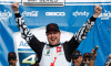Kurt Busch celebrates in victory lane after winning the NASCAR Cup Series AdventHealth 400 at Kansas Speedway on May 15, 2022