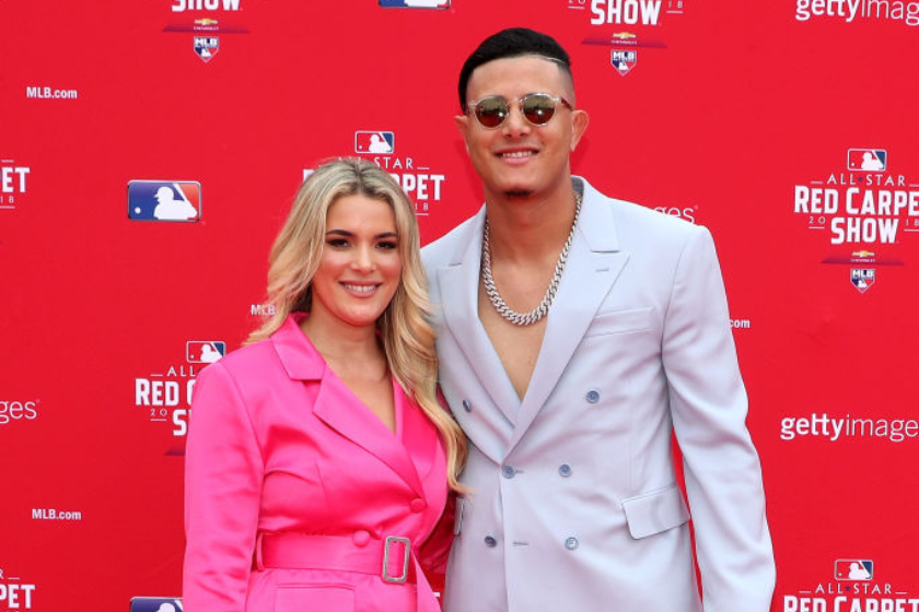 Manny Machado #13 then with the Baltimore Orioles and the American League attends the 89th MLB All-Star Game, presented by MasterCard red carpet with wife Yainee Alonso