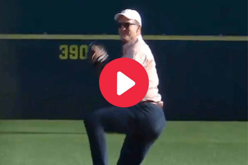 Peyton Manning throws out the first pitch at a UT game