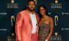 Aaron Donald and wife Erica Sherman pose for a picture.