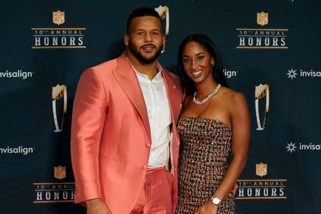 Aaron Donald and wife Erica Sherman pose for a picture.