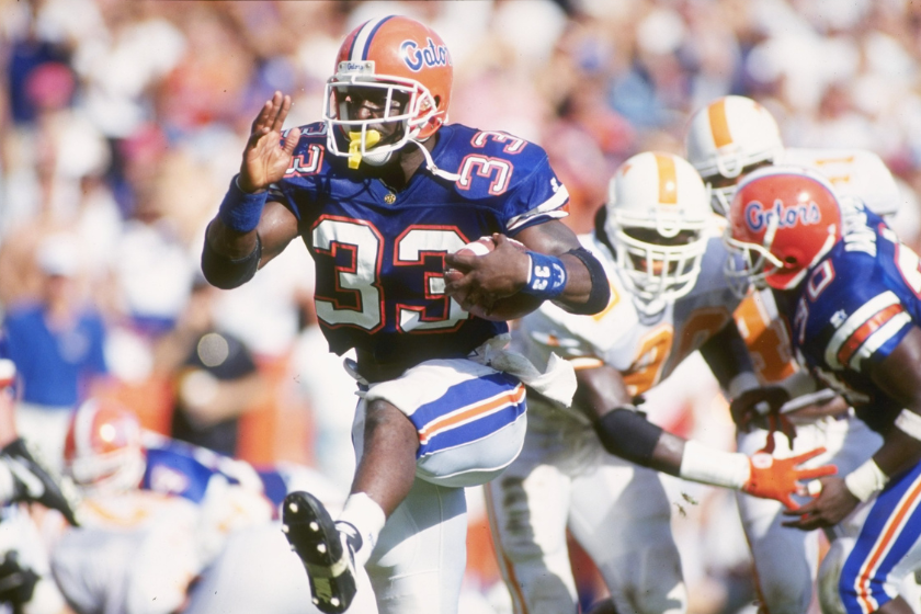 Running back Errict Rhett of the Florida Gators runs down the field during a game against the Tennessee Volunteers